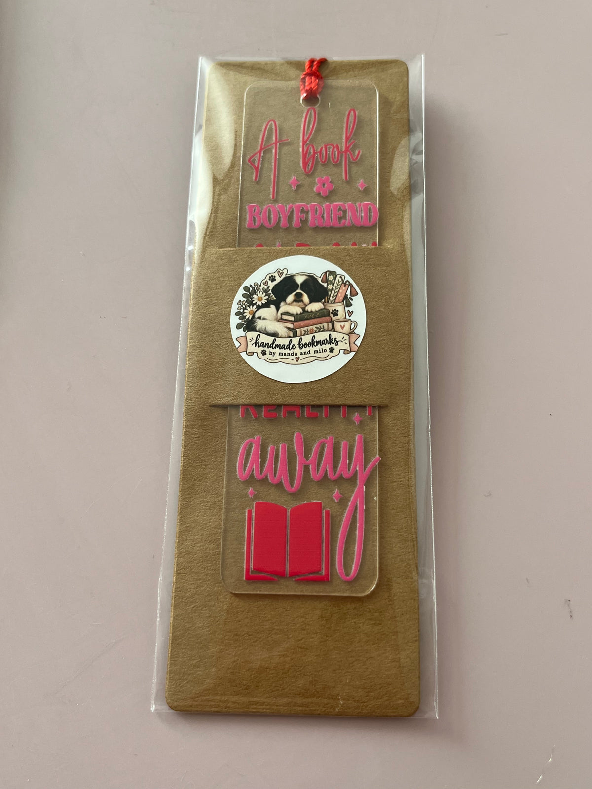 A book boyfriend keeps reality away bookmark